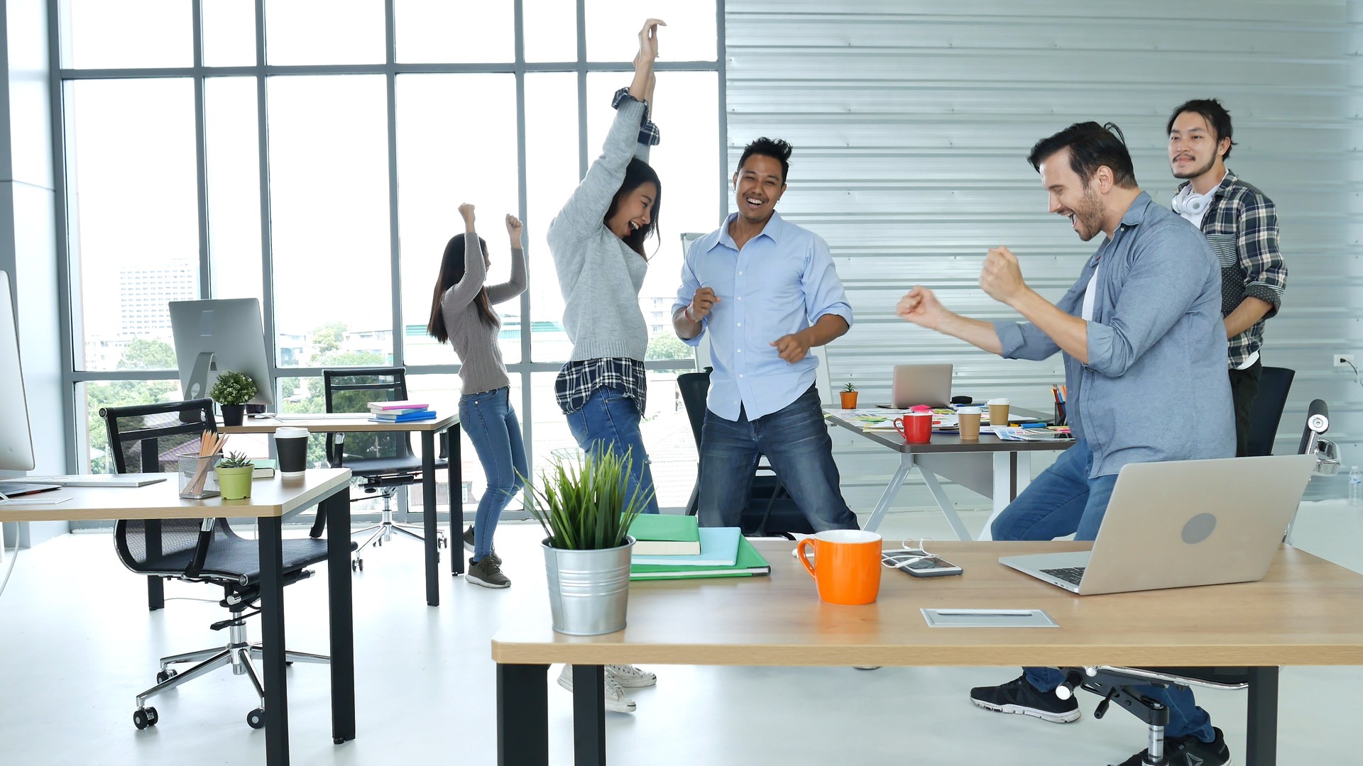 Office teamwork celebration working happiness Happy business people dance expression together at office after job done complete in meeting room. Diversity people happy moment dance together in company